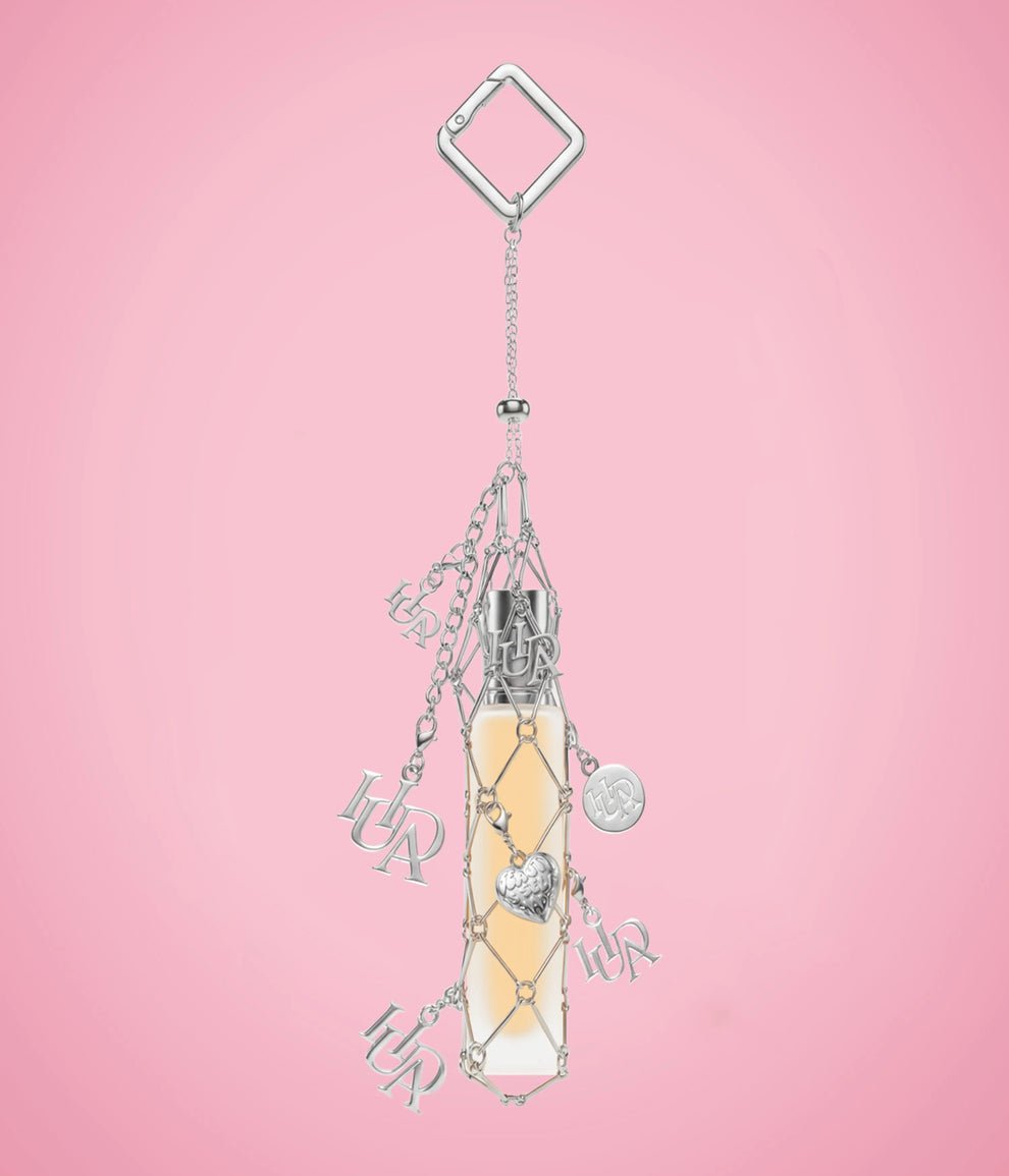 Huda Beauty TRAVEL SPRAY FRAGRANCE HOLDER WITH CHARMS